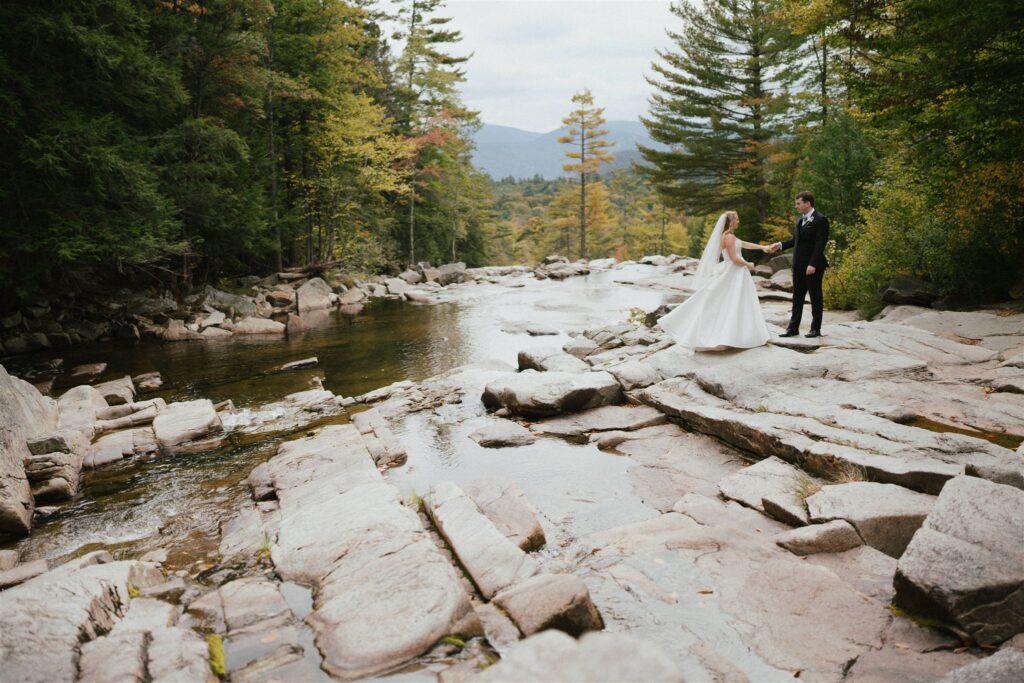 Couple dancing at Jackson Falls waterfall in Jackson, New Hampshire