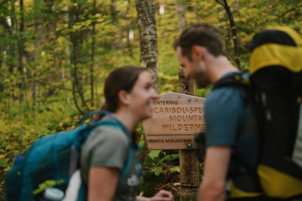 Couple getting ready to hike in the White Mountains. 