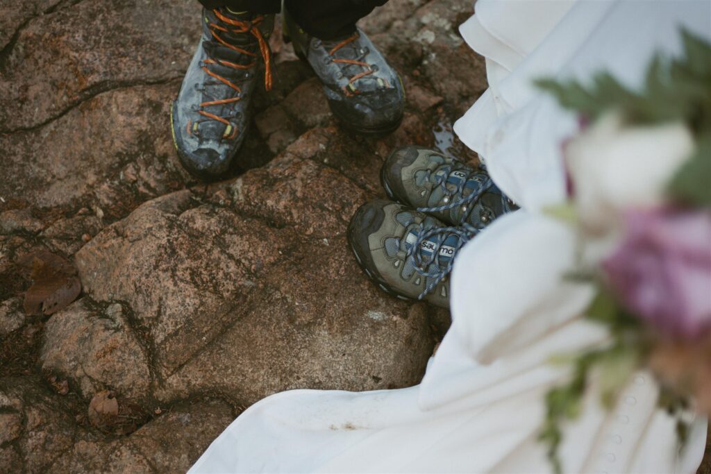 Hiking boots worn with wedding attire during a White Mountains elopement