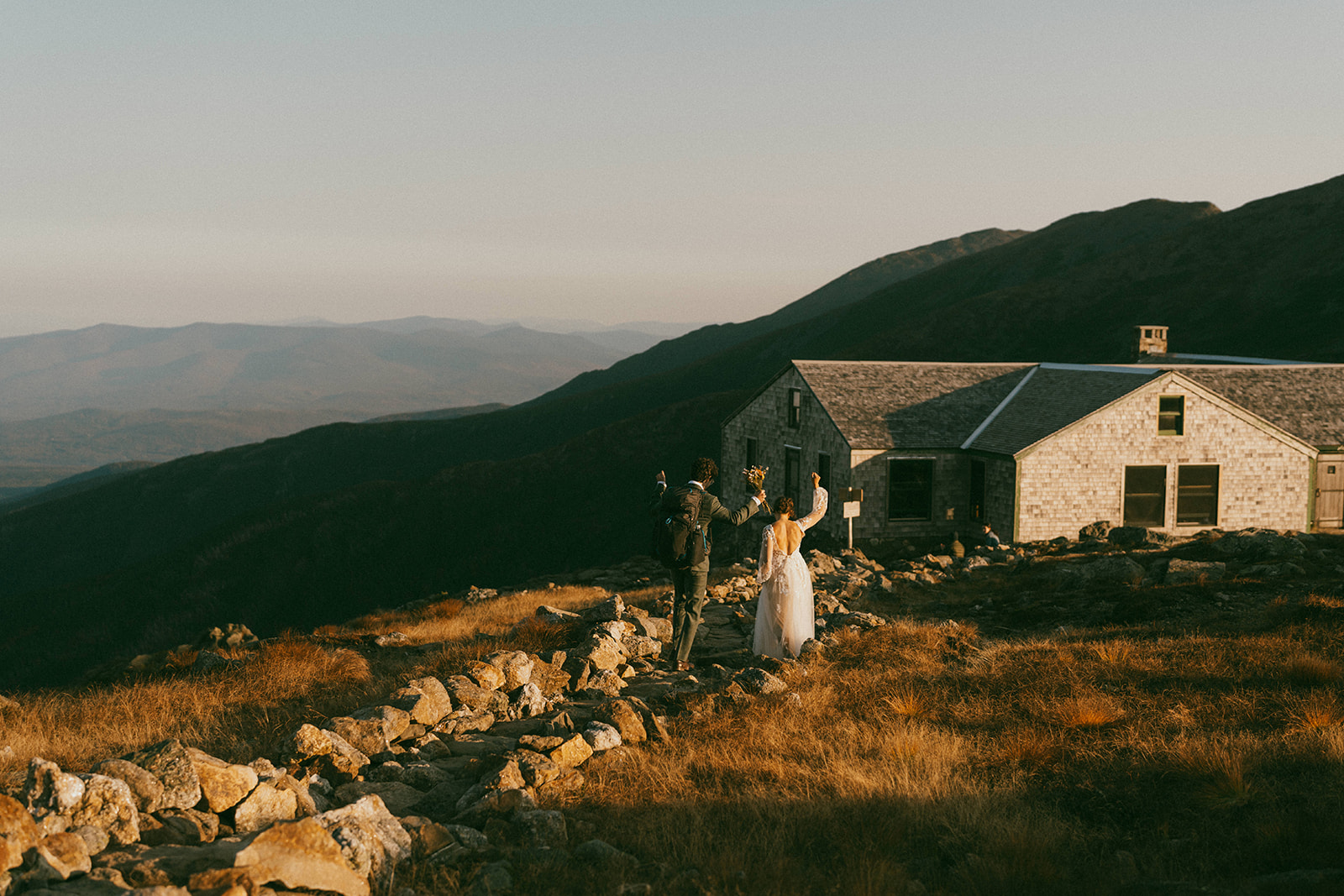 Couple hiking in the White Mountains of New Hampshire during an elopement