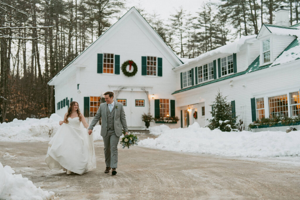 Couple walking outside a historic inn in the White Mountains of New Hampshire